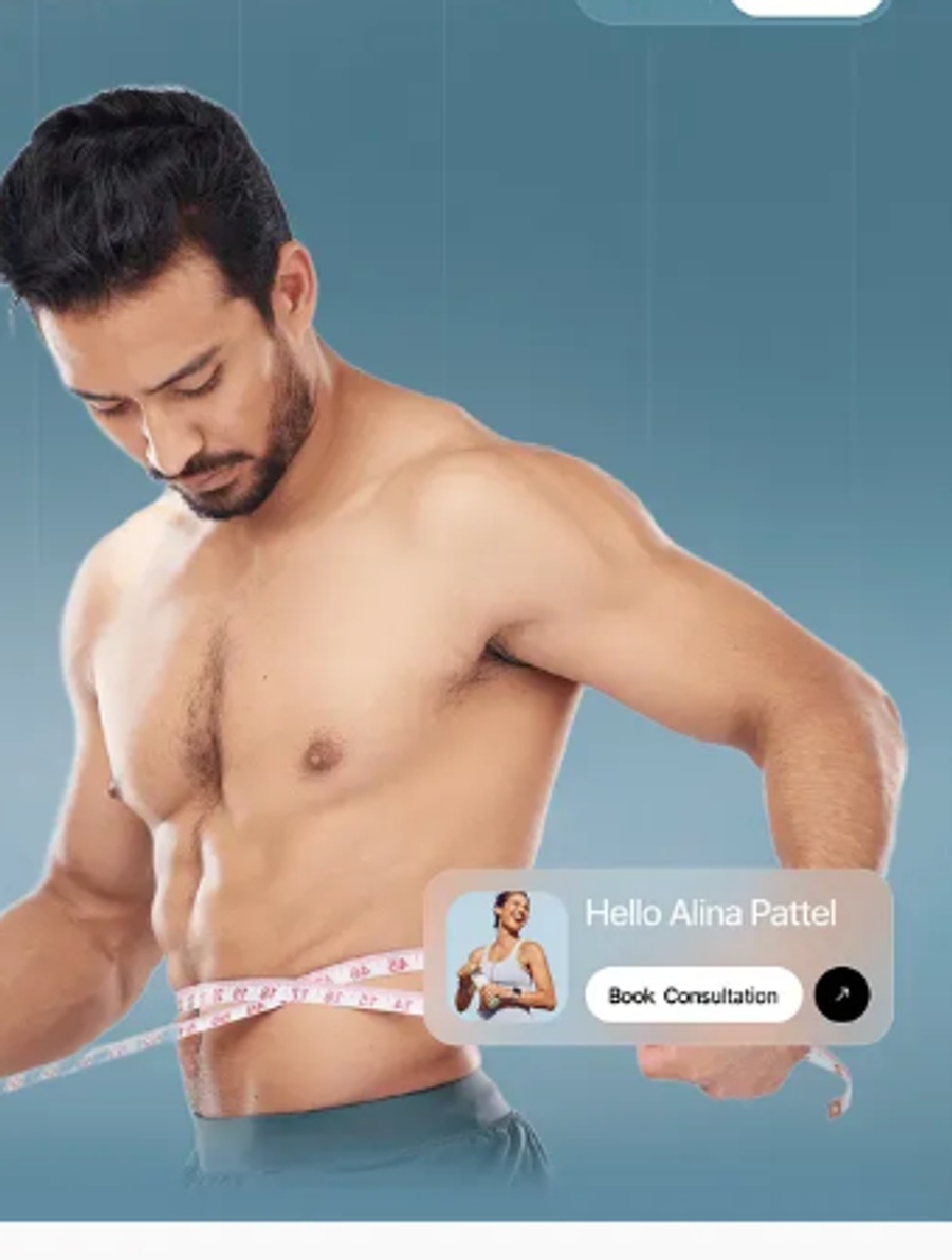 Athlete measuring waist for weight loss progress